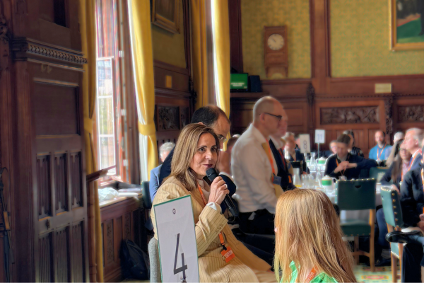 Marili Anderson, Rabobank moderating the panel in the House of Commons for SteelEye's Regs & Eggs 2026 talking about modern compliance challenges
