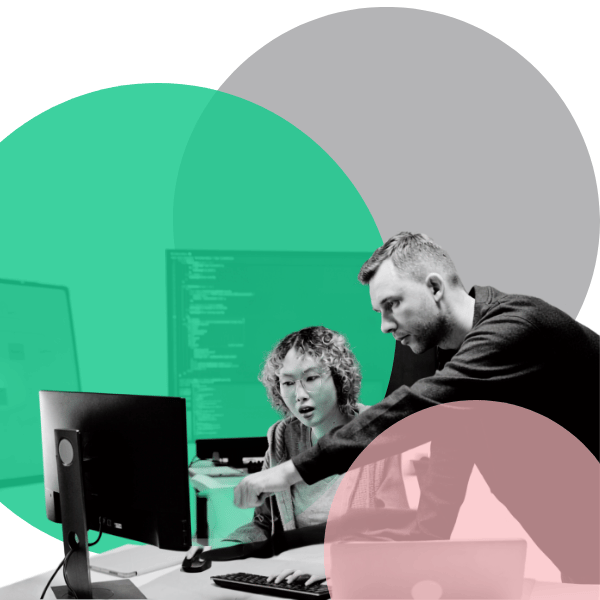 Two people looking at a screen showing Steeleye's AI capabilities Two people looking at a screen showing Steeleye's AI capabilities